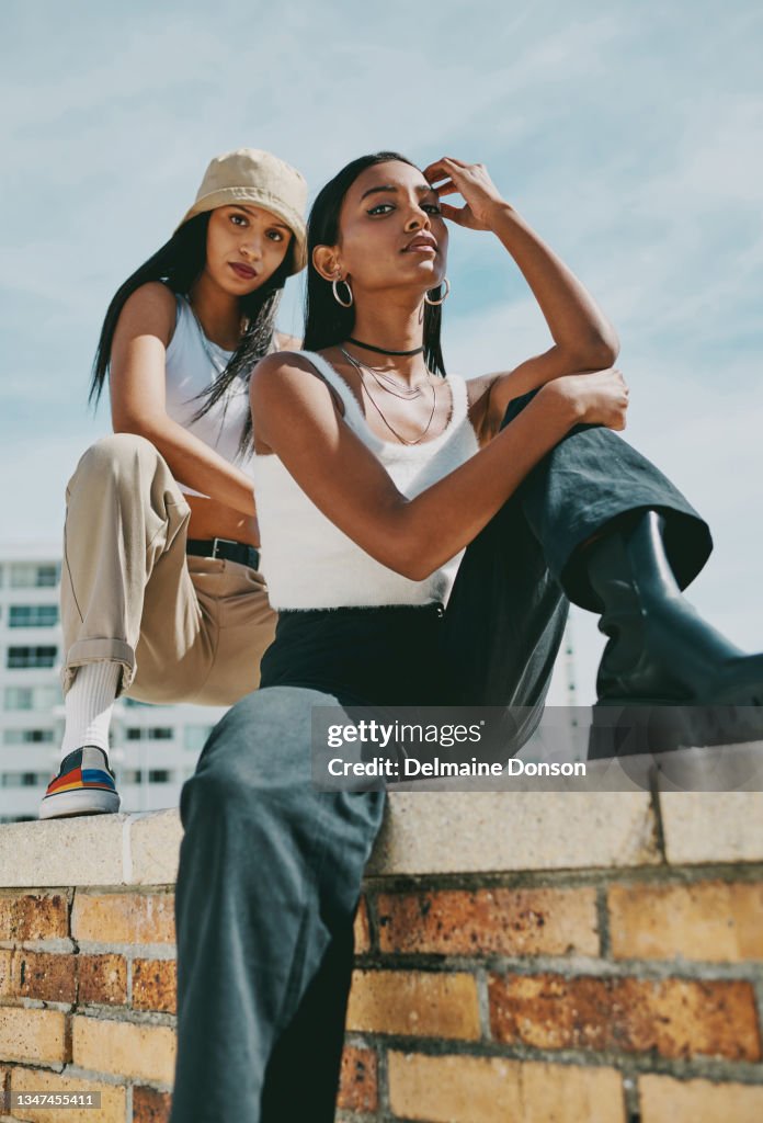 Shot of two young female friends spending a day in the city