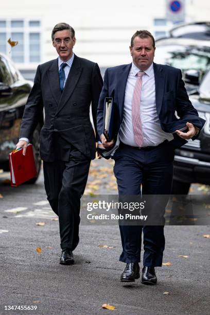 Leader of the House of Commons Jacob Rees-Mogg and Chief Whip Mark Spencer arrive at the Science Museum on October 19, 2021 in London, England. The...