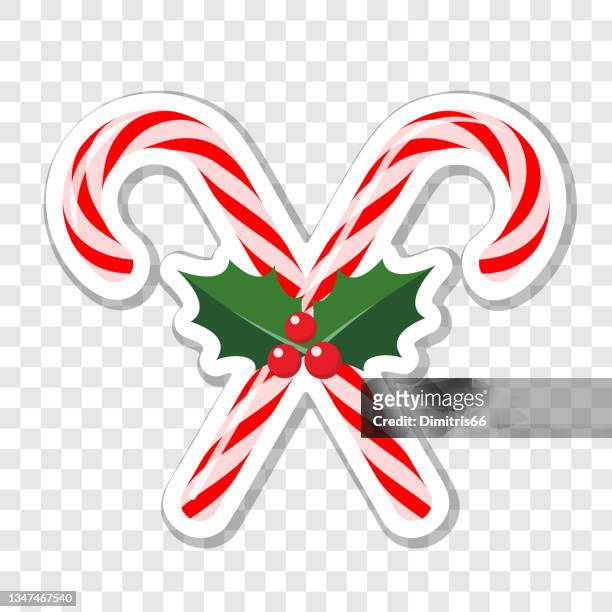 illustrazioni stock, clip art, cartoni animati e icone di tendenza di adesivo natalizio di bastoncini di caramelle incrociati con bacche e foglie di agrifoglio - bastoncino di zucchero