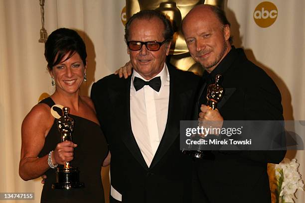 Cathy Schulman and Paul Haggis, winners Best Picture for Crash, with presenter Jack Nicholson