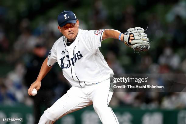 Daisuke Matsuzaka of the Saitama Seibu Lions throws his final throw of his professional career against Kensuke Kondo of the Hokkaido Nipponham...