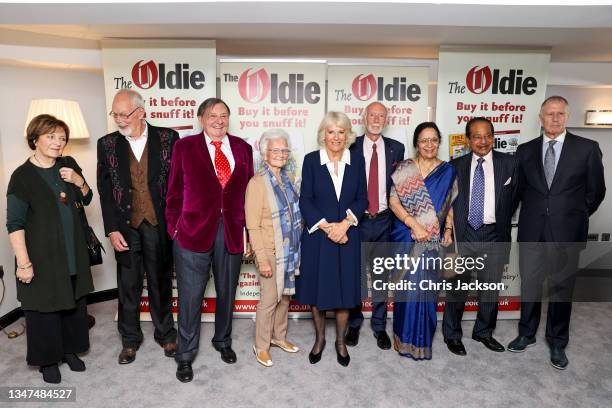 Winners of the Oldie Awards 2021 pose with Camilla, Duchess of Cornwall , Dame Delia Smith, 'Whispering' Bob Harris, Barry Humphries, Margaret...