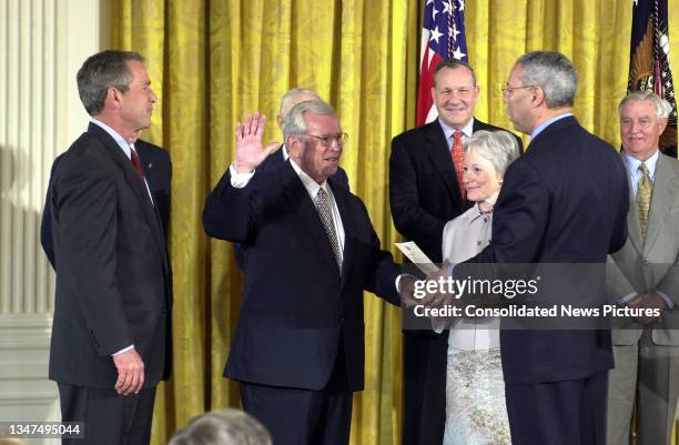 Former US Senator Howard Baker is sworn-in as US Ambassador to Japan by US Secretary of State Colin L Powell during a ceremony in the East Room at...