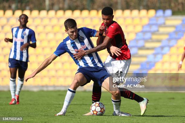 Emil Pakebba Joof Roback of AC Milan competes for the ball with David Vinhas of FC Porto during the UEFA Youth League match between FC Porto and AC...