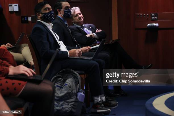 Sen. John Kennedy sits with journalists during a news conference about Republican senators' opposition to proposed reforms to the Internal Revenue...