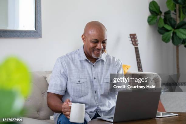 man on a video conference call - musician computer stock pictures, royalty-free photos & images