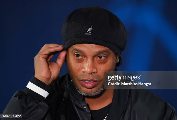 Ronaldinho, speaks to the media while working on TV prior to the UEFA Champions League group A match between Paris Saint-Germain and RB Leipzig at...