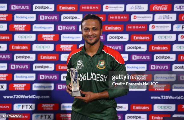 Shakib Al Hasan of Bangladesh poses after being named Player of the Match following the ICC Men's T20 World Cup match between Bangladesh and Oman at...