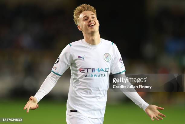Cole Palmer of Manchester City celebrates after scoring their side's fourth goal during the UEFA Champions League group A match between Club Brugge...