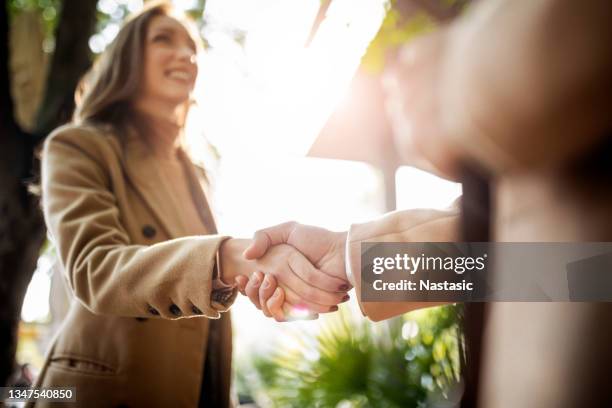 business hand shake - meal deal stock pictures, royalty-free photos & images