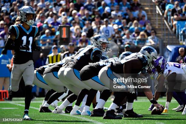 Quarterback Sam Darnold waits for the snap as wide receiver Robby Anderson of the Carolina Panthers is in motion during the Panthers' football game...