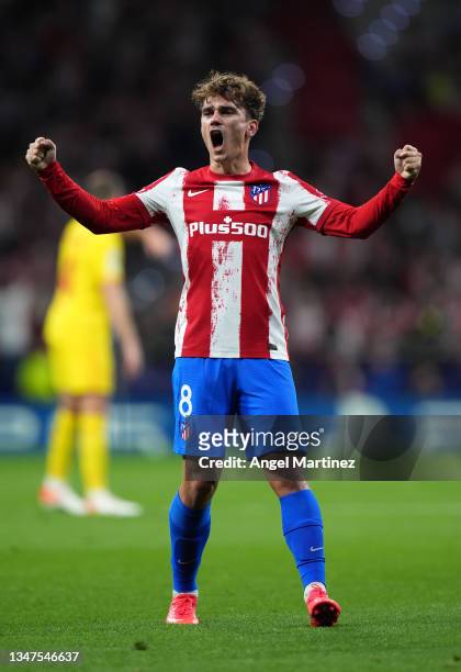 Antoine Griezmann of Atletico Madrid celebrates after scoring their side's second goal during the UEFA Champions League group B match between...