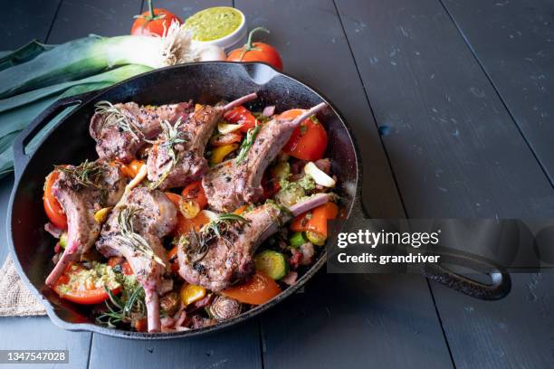 gourmet grilled lamb chops with rosemary and pesto sauce - lamb chop stock pictures, royalty-free photos & images