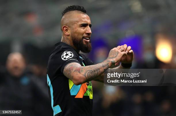 Arturo Vidal of FC Internazionale celebrates after scoring their side's second goal during the UEFA Champions League group D match between FC...