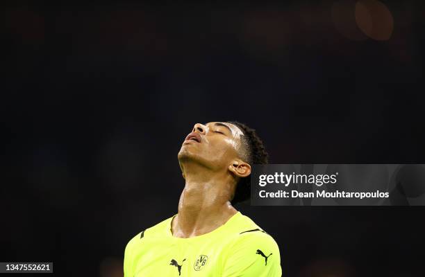 Jude Bellingham of Borussia Dortmund reacts after a missed chance during the UEFA Champions League group C match between AFC Ajax and Borussia...