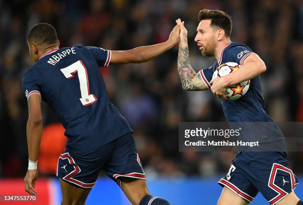 Lionel Messi of Paris Saint-Germain celebrates after scoring their side's second goal with Kylian Mbappe during the UEFA Champions League group A...
