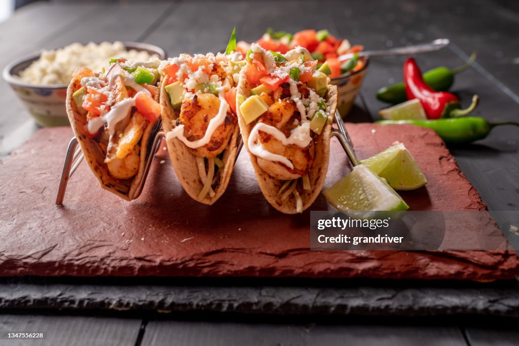A Platter With Three Gourmet Shrimp Tacos With Mango Habanero Salsa