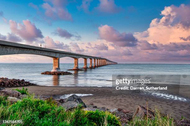 confederation bridge across the abegweit passage of the northumberland strait, canada - prince edward island stock pictures, royalty-free photos & images