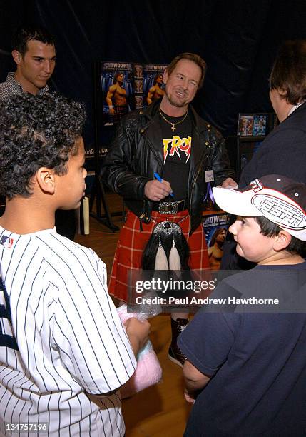 Professional Wrestler "Rowdy" Roddy Piper greets fans