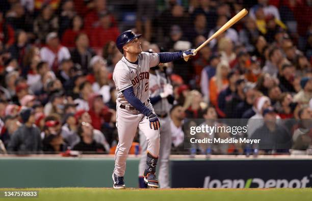 Alex Bregman of the Houston Astros hits a home run against the Boston Red Sox in the first inning of Game Four of the American League Championship...