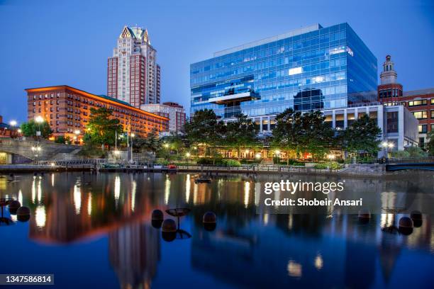 reflection of providence waterplace park at night, rhode island - rhode island bridge stock pictures, royalty-free photos & images