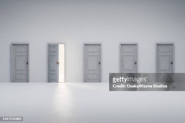 white wall with five doors, choice and decision - built space stock pictures, royalty-free photos & images