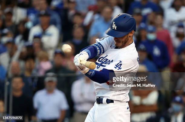 Cody Bellinger of the Los Angeles Dodgers hits a 3-run home run during the 8th inning of Game 3 of the National League Championship Series against...