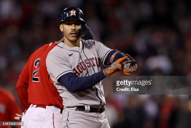 Carlos Correa of the Houston Astros reacts after he hit a double against the Boston Red Sox in the ninth inning of Game Four of the American League...