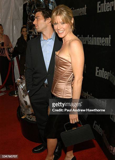 Julie Bowen and fiance Scott Phillips attend Entertainment Weekly's party celebrating their 10th Anniversary Oscar Party with a host of celebrities...