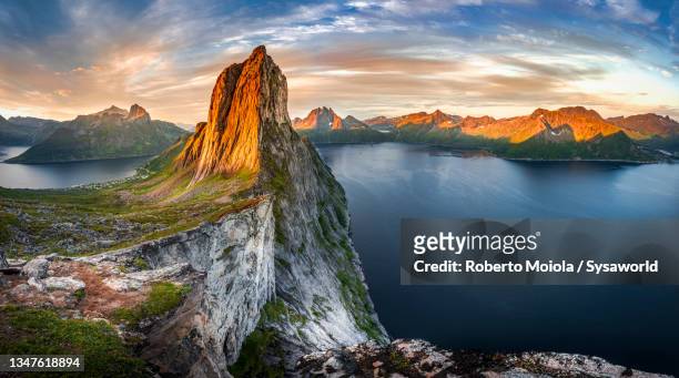 segla mountain peak at sunrise, senja, norway - isola di senja foto e immagini stock