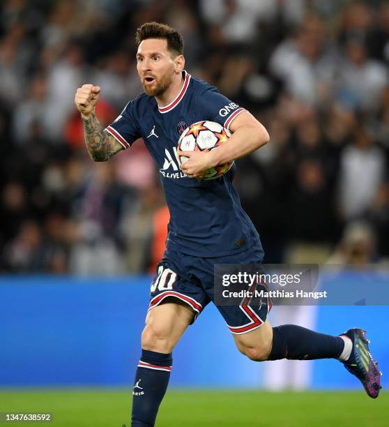 Lionel Messi of Paris Saint-Germain celebrates after scoring their side's second goal during the UEFA Champions League group A match between Paris...