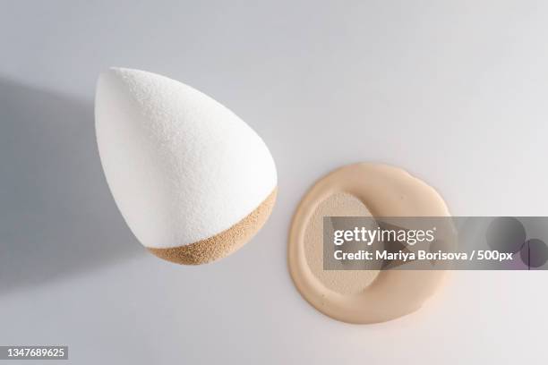 high angle view of egg carton on white background - bath sponge stock pictures, royalty-free photos & images