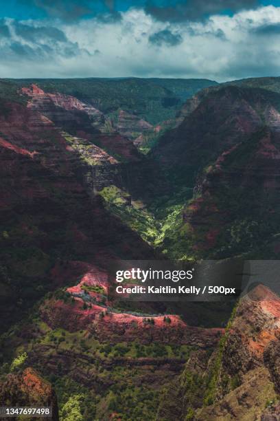 high angle view of landscape against sky,waimea canyon state park,united states,usa - waimea canyon state park stock pictures, royalty-free photos & images