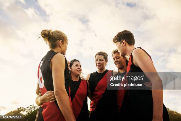 getting ready to play the toughest sport - afl woman stock pictures, royalty-free photos & images