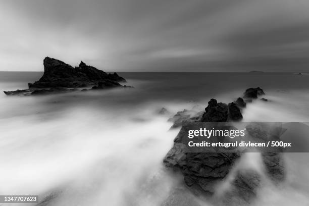 scenic view of rocks in sea against sky,turkey - ertugrul stock pictures, royalty-free photos & images