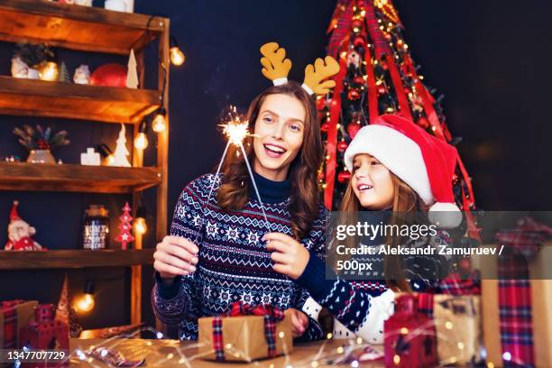 holidays,family and people concept happy mother and little girl - happy holidays family stock pictures, royalty-free photos & images