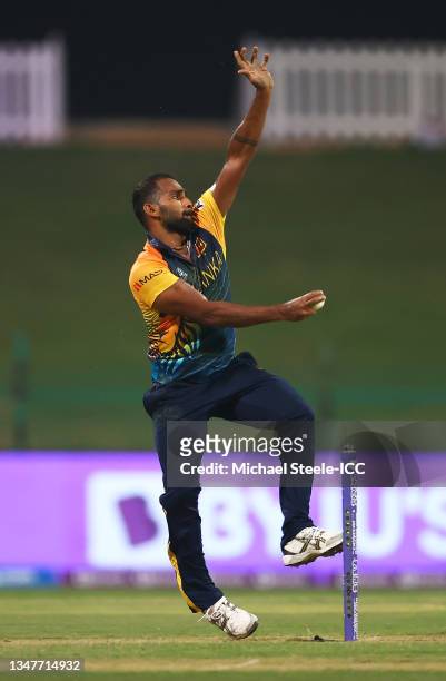 Chamika Karunaratne of Sri Lanka in bowling action during the ICC Men's T20 World Cup match between Sri Lanka and Ireland at Sheikh Zayed stadium on...