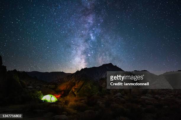 lone pine camping under the milky way - nature reserve stock pictures, royalty-free photos & images