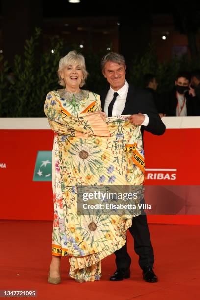 Caterina Caselli and Renato De Maria attend the red carpet of the movie "Caterina Caselli - Una Vita, Cento Vite" during the 16th Rome Film Fest 2021...