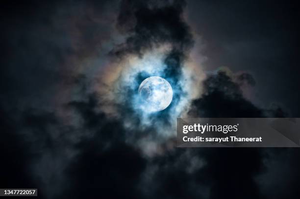 the full moon during the night when the clouds obscured the atmosphere seemed dark, magical and mysterious. - moody sky moon night stock pictures, royalty-free photos & images