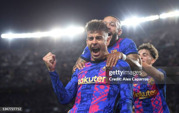 Gerard Pique of FC Barcelona celebrates after scoring their team's first goal during the UEFA Champions League group E match between FC Barcelona and...