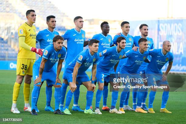 The team line up for a photo prior to kick off of CF Fuenlabrada during the LaLiga Smartbank match between CF Fuenlabrada and SD Amorebieta at...