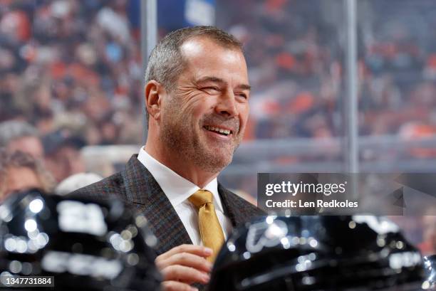 Head coach Alain Vigneault of the Philadelphia Flyers reacts to a call on the ice against the Vancouver Canucks at the Wells Fargo Center on October...