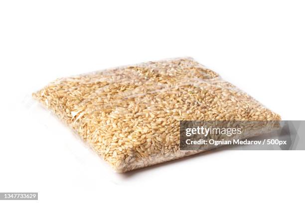brown rice package - transparent bag stock pictures, royalty-free photos & images