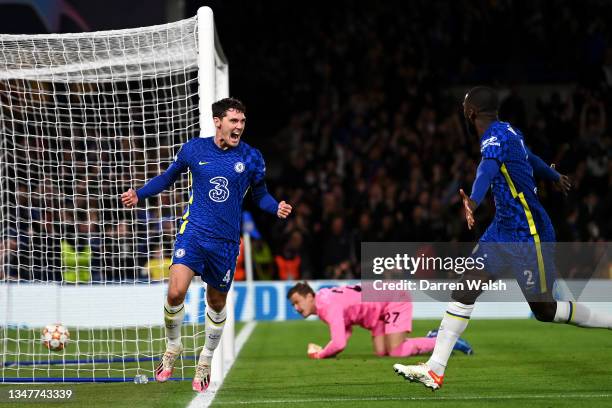 Andreas Christensen of Chelsea celebrates with teammate Antonio Ruediger after scoring their team's first goal during the UEFA Champions League group...