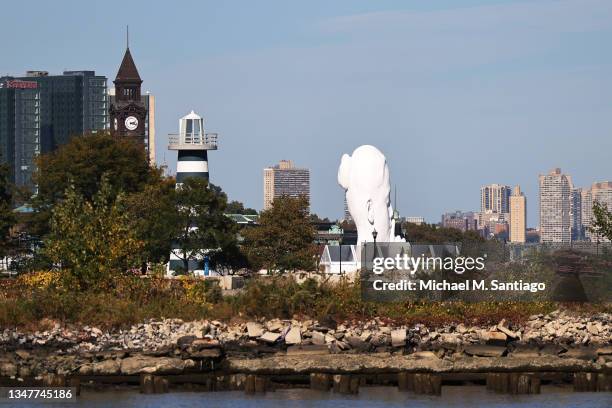The "Water's Soul" sculpture by Spanish artist Jaume Plensa is seen from the Hudson River Waterfront Walkway on October 20, 2021 in Jersey City, New...