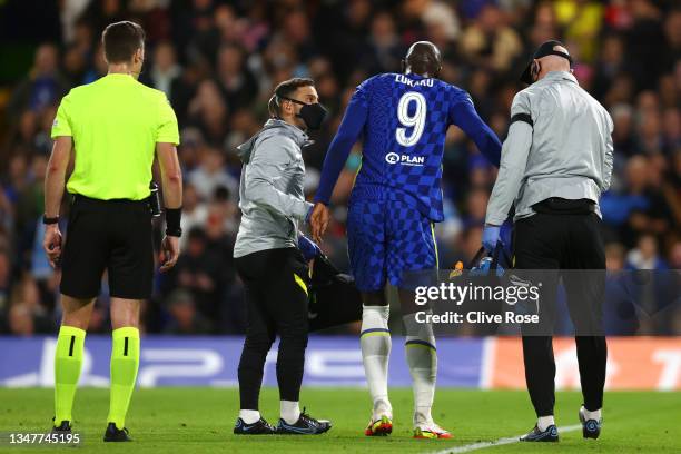 Romelu Lukaku of Chelsea walks off the pitch after receiving medical treatment during the UEFA Champions League group H match between Chelsea FC and...