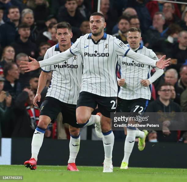 Merih Demiral of Atalanta celebrates scoring their second goal during the UEFA Champions League group F match between Manchester United and Atalanta...
