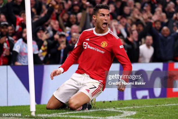 Cristiano Ronaldo of Manchester United celebrates after scoring their side's third goal during the UEFA Champions League group F match between...