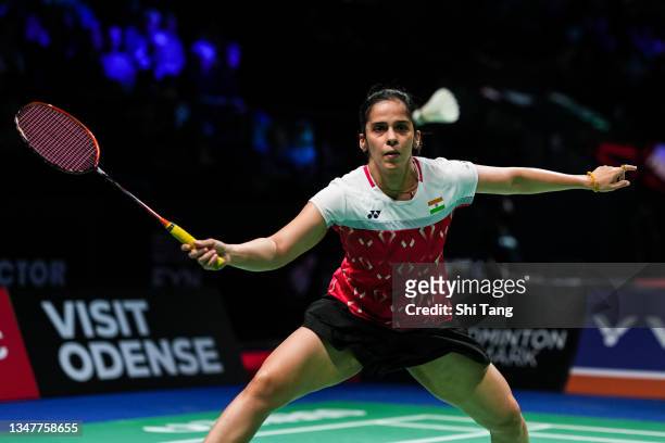 Saina Nehwal of India competes in the Women's Singles first round match against Aya Ohori of Japan on day two of the Denmark Open at Odense Sports...